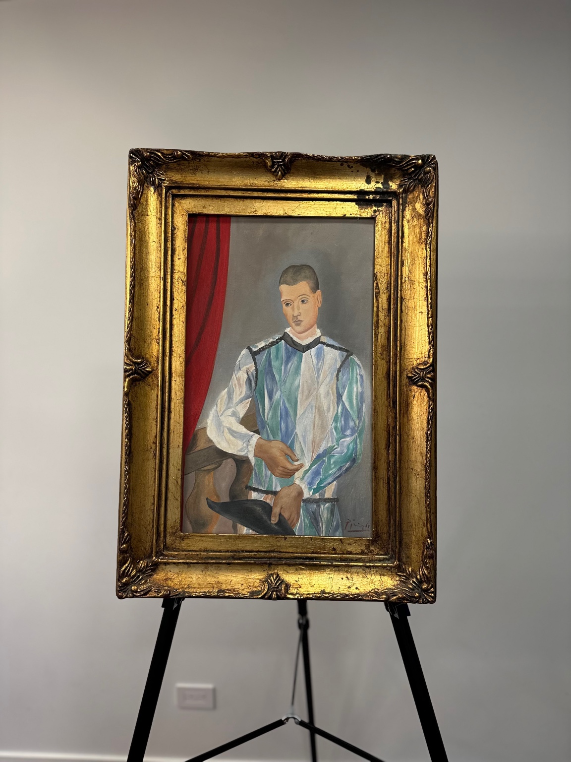 Picasso — Harlequin (1915). Melancholic jester, geometric styling.